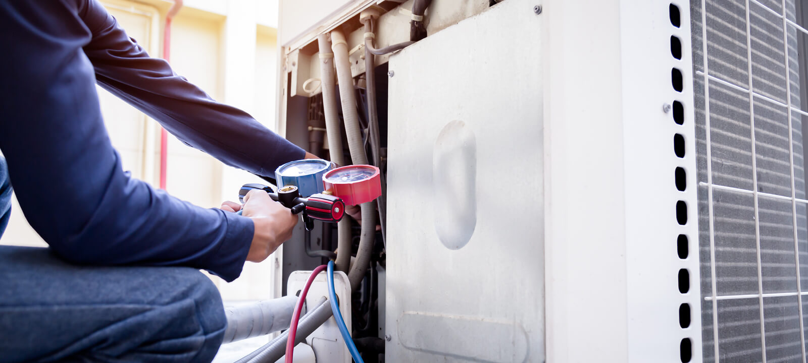 Technician Is Checking Air Conditioner ,measuring Equipment For